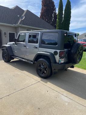 Silver 2013 Jeep Wrangler Unlimited Sport