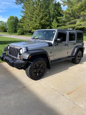 Silver 2013 Jeep Wrangler Unlimited Sport