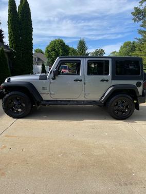 Silver 2013 Jeep Wrangler Unlimited Sport