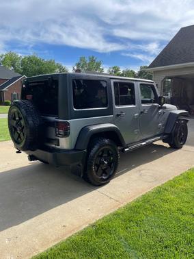 Silver 2013 Jeep Wrangler Unlimited Sport