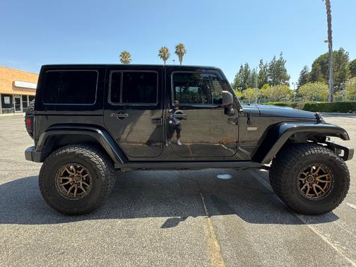 Black 2017 Jeep Wrangler Unlimited Sahara