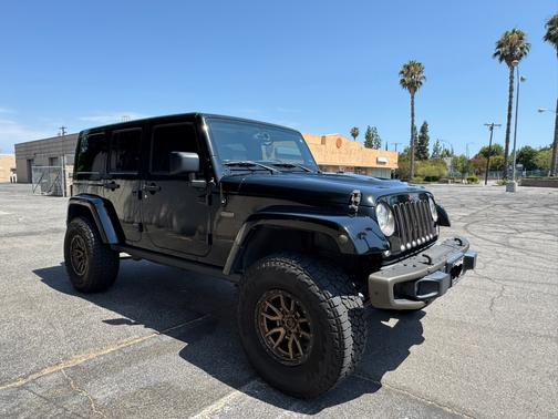 Black 2017 Jeep Wrangler Unlimited Sahara