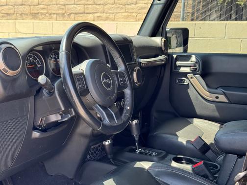 Black 2017 Jeep Wrangler Unlimited Sahara