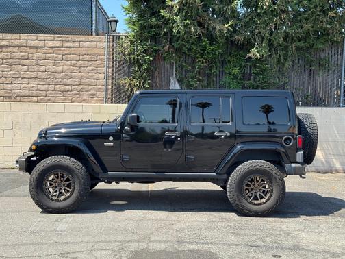 Black 2017 Jeep Wrangler Unlimited Sahara