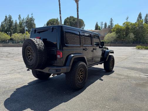 Black 2017 Jeep Wrangler Unlimited Sahara