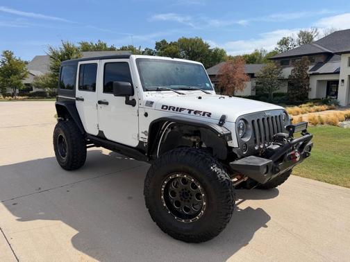 White 2013 Jeep Wrangler Unlimited Freedom Edition
