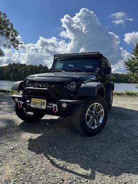 Black 2010 Jeep Wrangler Sport