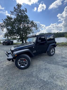 Black 2010 Jeep Wrangler Sport