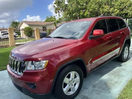 Red 2011 Jeep Grand Cherokee Laredo