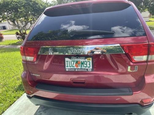 Red 2011 Jeep Grand Cherokee Laredo