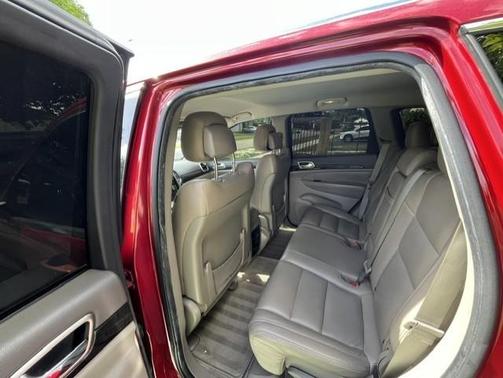 Red 2011 Jeep Grand Cherokee Laredo