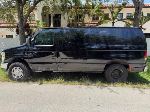 Black 2014 Ford E150 Cargo
