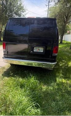 Black 2014 Ford E150 Cargo
