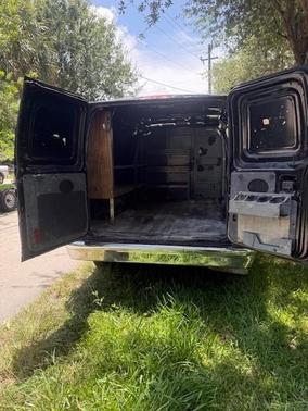 Black 2014 Ford E150 Cargo