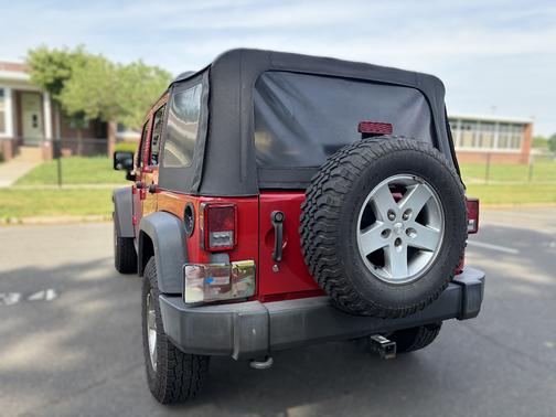 Red 2010 Jeep Wrangler Unlimited Rubicon