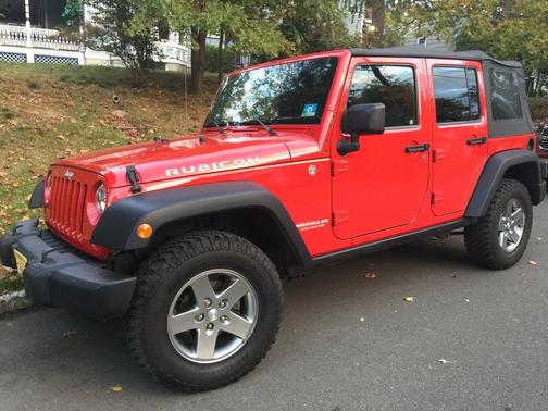 Red 2010 Jeep Wrangler Unlimited Rubicon