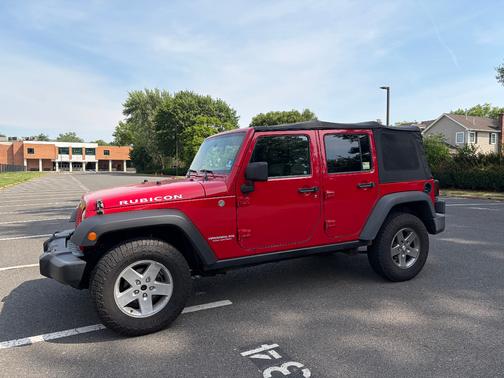 Red 2010 Jeep Wrangler Unlimited Rubicon