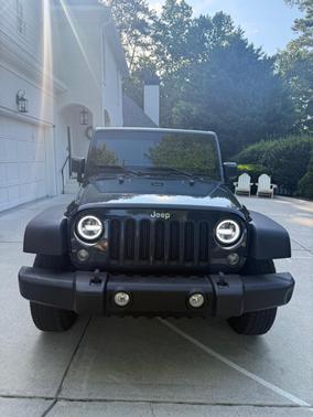 Gray 2017 Jeep Wrangler Unlimited Sport
