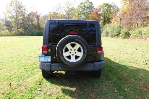 Black 2014 Jeep Wrangler Unlimited Sport