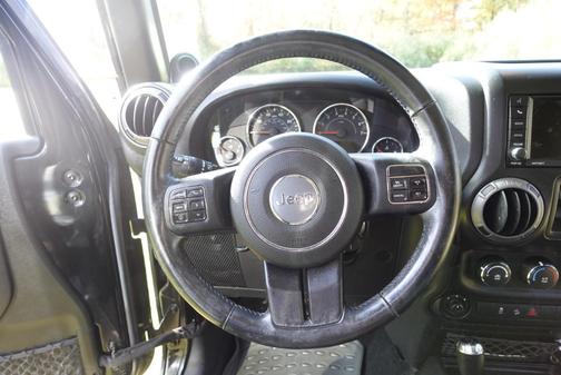 Black 2014 Jeep Wrangler Unlimited Sport