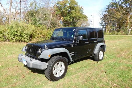 Black 2014 Jeep Wrangler Unlimited Sport