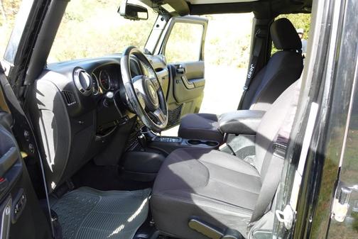 Black 2014 Jeep Wrangler Unlimited Sport