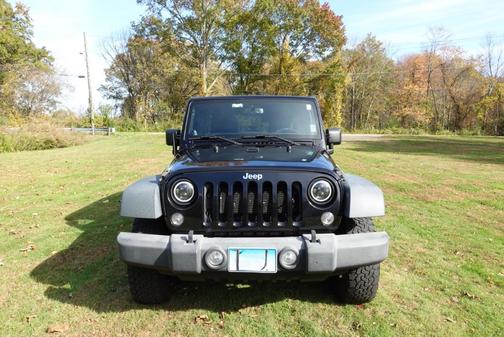 Black 2014 Jeep Wrangler Unlimited Sport