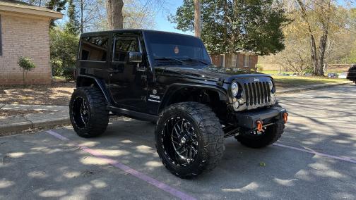 Photo 1 of 12 of 2013 Jeep Wrangler Sport