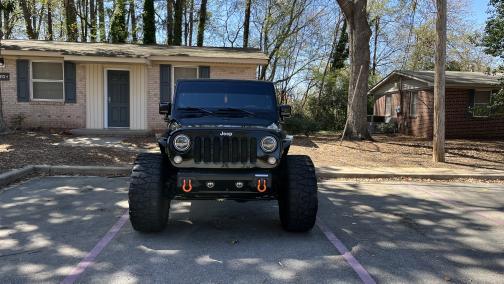 Photo 3 of 12 of 2013 Jeep Wrangler Sport