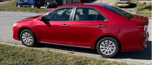 Red 2012 Toyota Camry LE