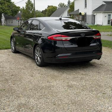 Black 2017 Ford Fusion Hybrid SE