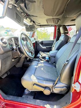 Red 2012 Jeep Wrangler Unlimited Freedom Edition