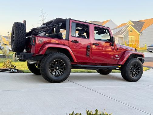 Red 2012 Jeep Wrangler Unlimited Freedom Edition