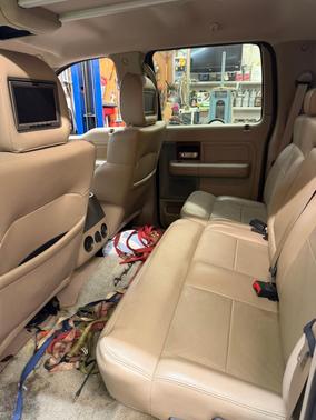 Red 2005 Ford F-150 Lariat SuperCrew