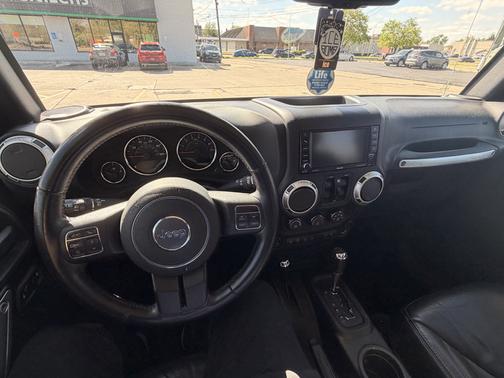 Black 2017 Jeep Wrangler Unlimited Sahara