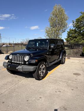 Black 2017 Jeep Wrangler Unlimited Sahara