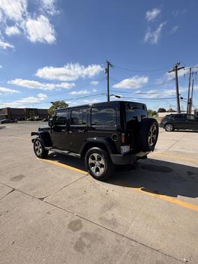 Black 2017 Jeep Wrangler Unlimited Sahara
