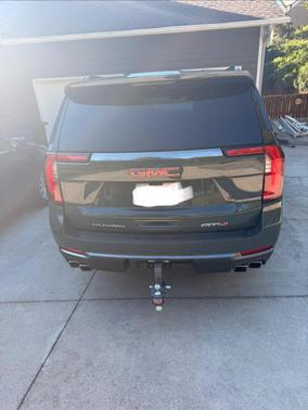 Green 2025 GMC Yukon XL AT4