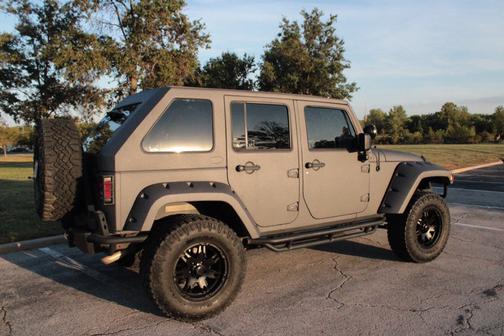 Gray 2012 Jeep Wrangler Unlimited Sport