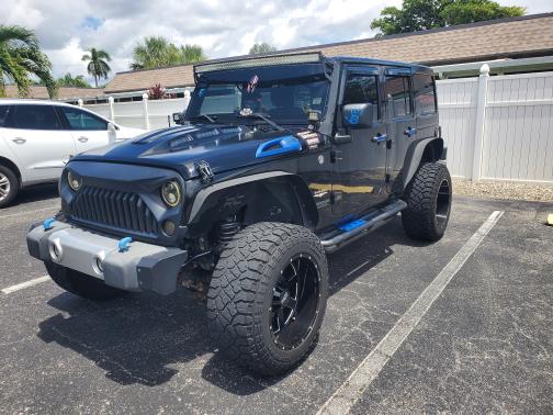 Black 2014 Jeep Wrangler Unlimited Sahara