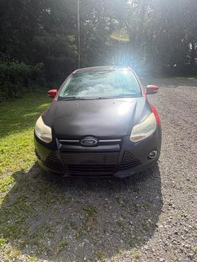 Red 2012 Ford Focus SEL