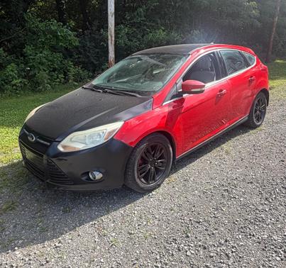 Red 2012 Ford Focus SEL