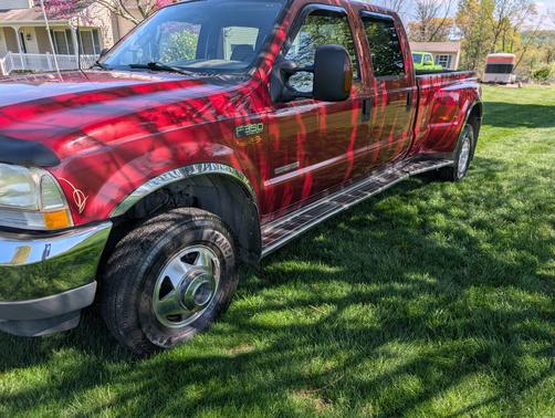 Red 2003 Ford F-350 Lariat Crew Cab Super Duty DRW