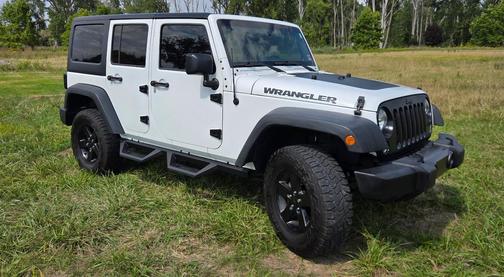 White 2016 Jeep Wrangler Unlimited Sport