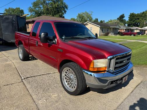 Red 2001 Ford F-250 Lariat SuperCab