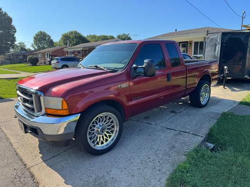 Red 2001 Ford F-250 Lariat SuperCab