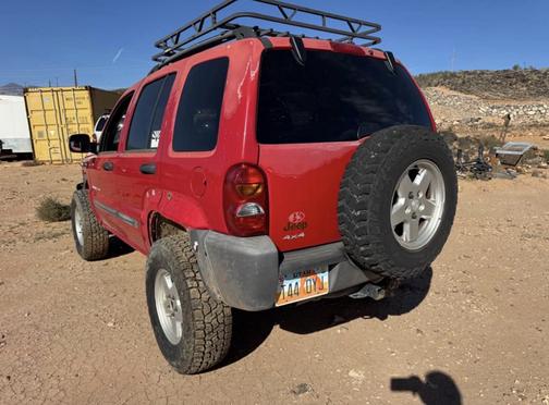 Red 2003 Jeep Liberty Sport