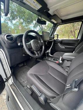 White 2015 Jeep Wrangler Unlimited Sport