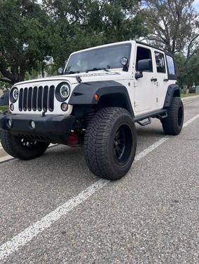 White 2015 Jeep Wrangler Unlimited Sport