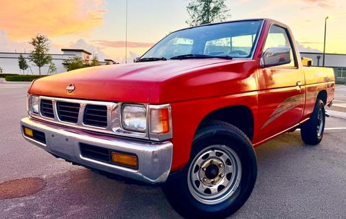 Red 1995 Nissan Pickup Truck XE